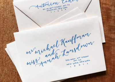 Whimsical Lettering on Blush Envelopes with Navy Ink
